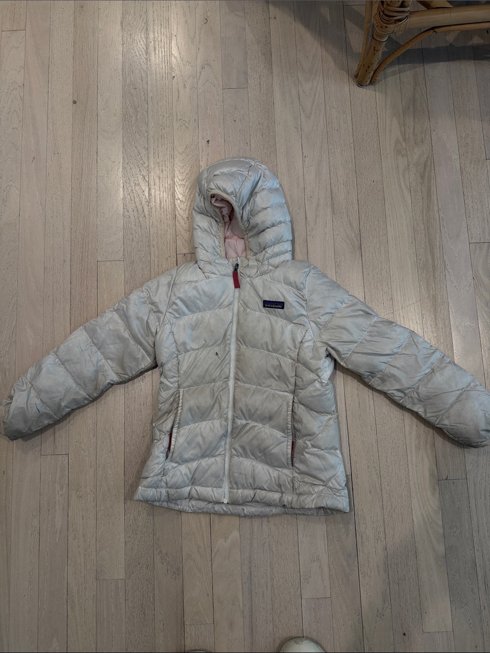 Very well loved Patagonia white puffer jacket with pink lining